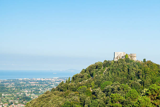 Il Castello Aghinolfi sulla sommit&agrave; del colle, tra il verde e il mare